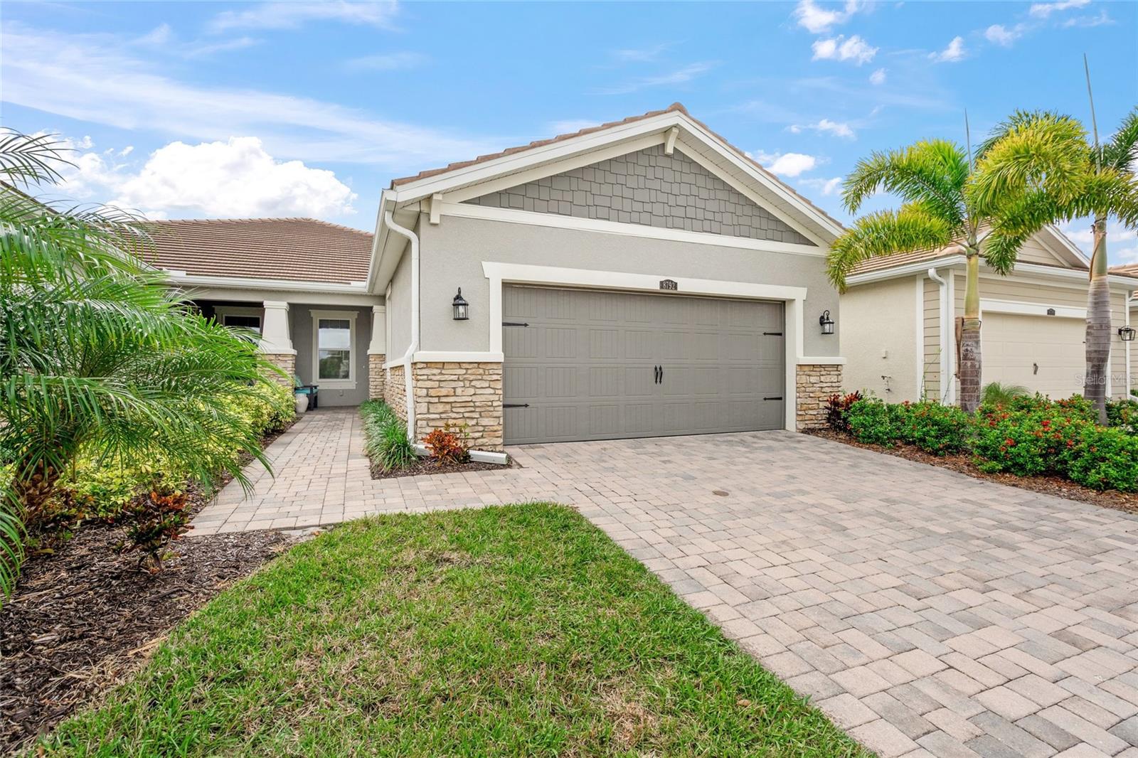 Discover an enchanting residence in the premier, gated Sunrise Preserve community, where luxury meets the ultimate Florida lifestyle. This remarkable home is ideally just minutes from pristine beaches, turning every day into a coastal retreat. A standout feature is the extended rear paver lanai, providing a spacious covered area that beautifully enhances outdoor living. Crafted by the renowned Mattamy Homes, this residence showcases an exceptional open-concept layout that creates a seamless flow throughout the living spaces. From the moment you arrive, the elegance is evident, with a paver driveway leading to a secluded entrance that hints at the sophistication awaiting inside. Upon entering, you are welcomed by an impressive foyer leading to a residence with a carefully selected neutral color palate and lighting fixtures that elevate the home's aesthetic. Safety is a priority, with full hurricane protection shutters, offering peace of mind during storm seasons. The gourmet kitchen serves as the heart of the home, ideal for culinary enthusiasts. It features a range with gas available, luxurious quartz countertops, and a large center island that combines functionality with elegance. Imagine unwinding on your private lanai, soaking in the serene ambiance. The primary bedroom serves as a true sanctuary, complete with a spacious walk-in closet. The primary bath is a luxurious retreat, boasting a walk-in shower, dual vanities and a separate toilet area. Additional features include a separate den/office with double French doors, a second bedroom and bath, a laundry room and a two-car garage. Sunrise Preserve is a resort-style community that offers easy access to Interstate 75 and is centrally near all Sarasota has to offer. Enjoy a spectacular pool and clubhouse, a state-of-the-art fitness center, pickleball and tennis courts, a cozy firepit and more. Plus, top-rated schools and the Legacy Bike Trail are just moments away, making this residence the ideal place to call home. The School District is planning to change for K-8th grade at the beginning of the 2025-2026 school year to Sky Ranch School. They are planning to open August 2025.