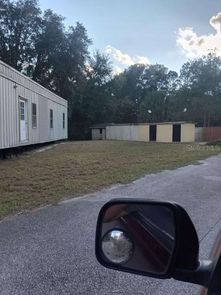 Property description 18654 S. E. 22nd Pl., Silver Spring, FL waterfront property have a Canal on the property running from the lake