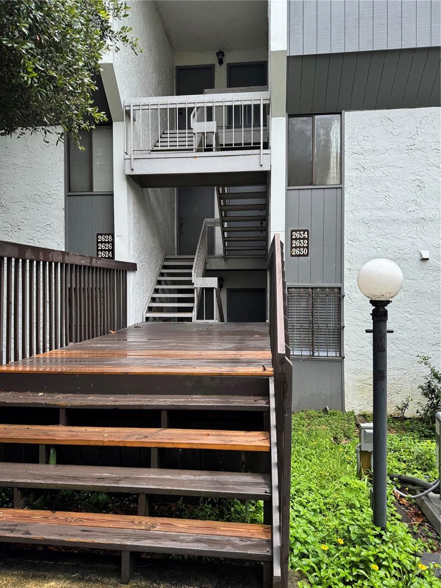 Completely Remodeled one bedroom and one bathroom retreat by Lake Bivens South. This condo apartment welcomes you with an open-concept layout, creating an inviting flow between the kitchen, living, and dining areas—ideal for both entertaining and relaxing. The brand-new HVAC and water heater ensure energy-efficient comfort year-round. Gourmet-style kitchen boasts sleek stainless steel appliances, granite countertops, abundant cabinetry, and a luxe backsplash. Sliding door leading out to a bright sunroom—perfect for morning coffee or casual lounging. The bedroom features a generous walk-in closet, while the stylish bathroom offers updated fixtures and finishes. There is a dedicated laundry room complete with washer/dryer and extra storage cabinets. Durable vinyl flooring throughout adds both elegance and ease of maintenance. Step outside to enjoy the community’s waterfront amenities: take a dip in the pool, host gatherings under the covered pavilion, launch your kayak or canoe, and access the shared dock—just steps from your door. Located off SW 13th Street, close to Archer road and conveniently close to UF, Shands Hospital, Butler Plaza, and Celebration Pointe, this home is perfect for professionals or anyone seeking a peaceful retreat without sacrificing access to vibrant city life. Don’t miss the opportunity to make this turnkey gem yours.