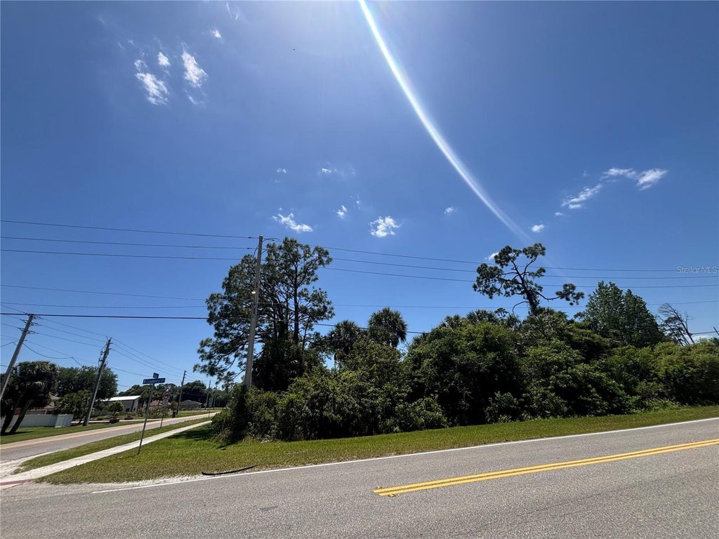 Photo of 11 N Chamberlain Boulevard, North Port, FL 34286 (MLS # C7526898)
