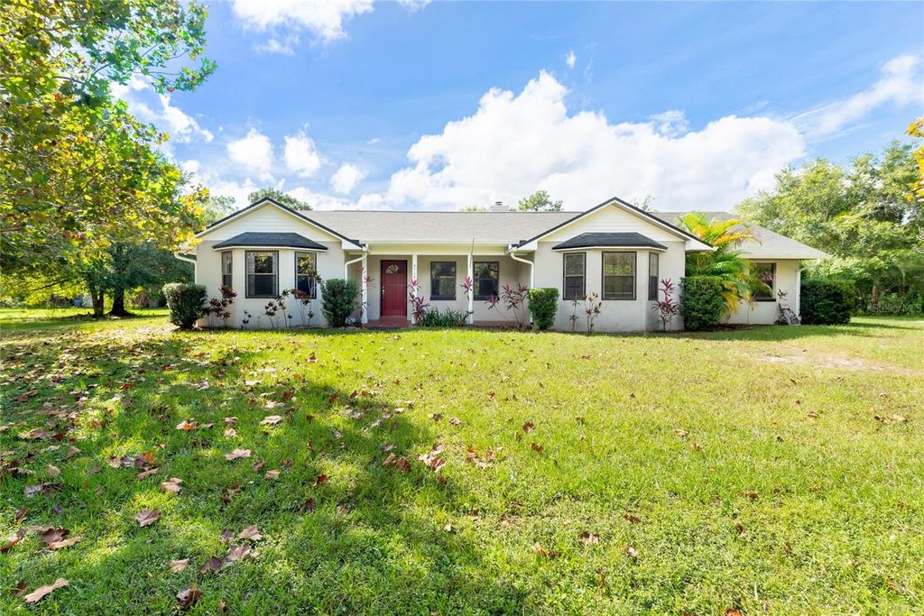 Photo of 4510 Pine Tree Drive, Saint Cloud, FL 34772 (MLS # R4910049)