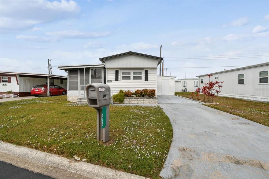 Prime location in the highly sought-after Leisure Lakes Mobile Home Park. This community, exclusively for residents aged 55 and older, offers a prime location and incredibly low monthly fees that include water, sewer, and trash. The park is well-maintained and features excellent amenities, including a clubhouse, swimming pool, fitness center, pickleball and shuffleboard courts, a bocce ball court, and a library.
This specific mobile home is a two-bedroom, two-bathroom unit, open kitchen, with an enclosed front porch, that offers great potential at an affordable price. While the property lost its carport due to the impact of Milton, the home and utility shed remain intact. This is a fantastic opportunity for a buyer looking for a home with a functional and open floor plan, and a home offering plenty of space. The location provides easy access to Bradenton, St. Pete, Tampa, Sarasota, and major highways (I-275/I-75). This home is also located in the pet section of Leisure Lakes, so bring your furry friend!