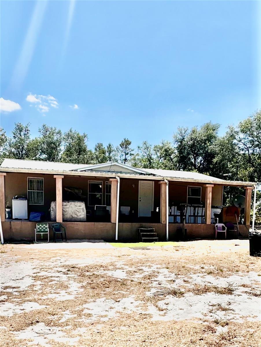 Back on the market!!!!!! This home is USDA approved, no down payment required!!!!! Escape the hustle and bustle of city life and enjoy peaceful country living on this picturesque 3.66-acre property in Frostproof. Whether looking for a move-in-ready home or a place to remodel and make your own, this property has everything. Enjoy your morning coffee on the spacious front porch with a view of wide-open spaces, fresh air, and a lifestyle that embraces simplicity and serenity. The home can be sold fully furnished, and yes, even the chickens are included. So bring your horse and don't miss this opportunity to enjoy the homestead lifestyle.
