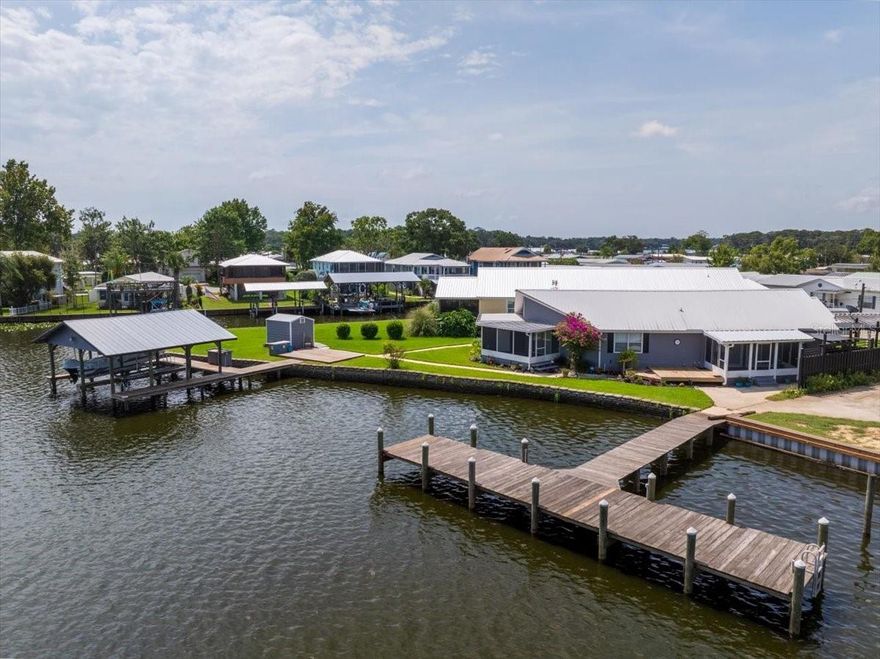 "The View You Did Not See Coming!" Explore premier riverfront living on the St. Johns River with this beautifully updated 3-bedroom, 2-bath home in the highly sought-after Sportsman's Harbor community in Welaka, FL. This Welaka riverfront property offers 1,968 sq ft of comfortable living space and an impressive 118 feet of direct St. Johns River frontage—ideal for anyone seeking a waterfront home in Northeast Florida. Built as a conventional, site-constructed home, the property features durable vinyl siding and a long-lasting metal roof, creating a low-maintenance riverfront residence perfect for year-round enjoyment. Boaters will appreciate the private dock, boat house with two lifts, and shared T-dock—excellent for fishing, cruising, or accessing the Intracoastal Waterway. The home also includes a storage shed and a 2-car carport for added convenience and functionality. Inside, this Welaka riverfront home showcases luxury vinyl plank flooring throughout, a modern kitchen with granite countertops, and

a neutral interior design that appeals to a wide range of buyers. Two screened back porches offer peaceful outdoor living spaces overlooking the St. Johns River, and a dedicated laundry area enhances everyday practicality.

If you're searching for a St. Johns River home for sale, a Welaka waterfront property, or a Northeast Florida boating community, this residence offers a rare combination of location, views, and lifestyle. Experience exceptional riverfront livingschedule your private showing today.