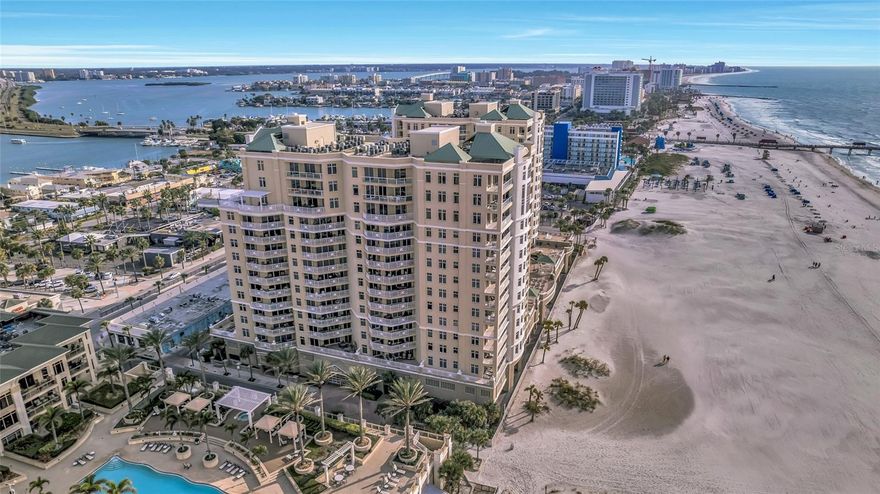 Welcome to your dream coastal retreat! This exquisite condominium offers the perfect blend of luxury, comfort, and breathtaking natural beauty. Nestled along the pristine shores of Florida's renowned coastline, this beachfront gem, perched just below penthouse level, offers unparalleled water views that will leave you spellbound. Ideally situated right on the sandy shores of Clearwater, Florida, you are just steps out your door for early morning strolls or sunset beachcombing on the powdery sands that stretch as far as the eye can see. The expansive windows and private balconies provide panoramic views of the sparkling turquoise waters of the Gulf of Mexico. Witness stunning sunrises and sunsets over the horizon from the comfort of your own home. Step inside and you'll find a thoughtfully designed living space flooded with natural light. The open-concept floor plan creates a seamless flow from the living area to the dining space and gourmet kitchen. High ceilings and large windows maximize the feeling of space and tranquility. The kitchen is a chef's dream, equipped with high-end stainless steel appliances, granite countertops, and ample cabinet space to prepare delicious meals while gazing out at the ocean or just have your entrees delivered from the adjoining resort hotel. The luxurious master suite is your private sanctuary, featuring its own balcony with ocean views, a walk-in closet, and an ensuite bathroom with a soaking tub and dual vanities. The legendary Sandpearl Residences offer room service from the resort adjacent, 24 hr. concierge, state of the art fitness, billiards, amenity level seaside pool, spa and cabanas, as well as social rooms w/billiards. Located in close proximity to vibrant local attractions, shopping, dining, and entertainment options, you'll have everything you need within reach while still enjoying a peaceful and serene beachfront lifestyle. Your safety and privacy are of utmost importance, with 24/7 security and private secure parking. This Florida beachfront condominium is not just a residence; it's a lifestyle. Whether you're seeking a permanent residence, a vacation home, or an investment property, this is a rare opportunity to own a piece of paradise. Immerse yourself in the beauty of Florida's Gulf Coast and create memories that will last a lifetime. Don't miss out on this chance to live the ultimate beachfront dream. Life is calling, be a part of it!