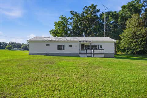 Photo of 4950 SE 112th Street Road, Belleview, FL 34420 (MLS # OM727569)