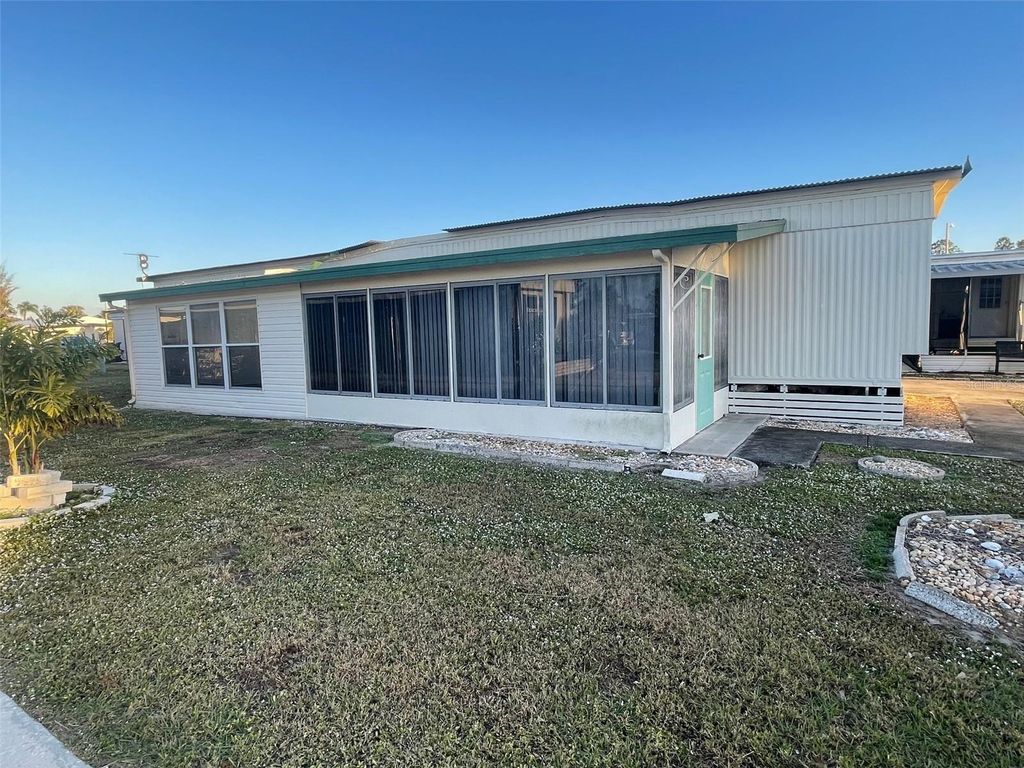 Photo of 105 Saint Martins Way, Apollo Beach, FL 33572 (MLS # TB8426927)