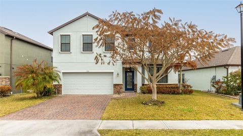 Photo of 1723 Musgrass Circle, Melbourne, FL 32904 (MLS # O6383489)