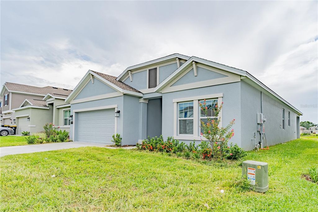 Photo of 849 Daring Drive, Davenport, FL 33837 (MLS # O6351990)