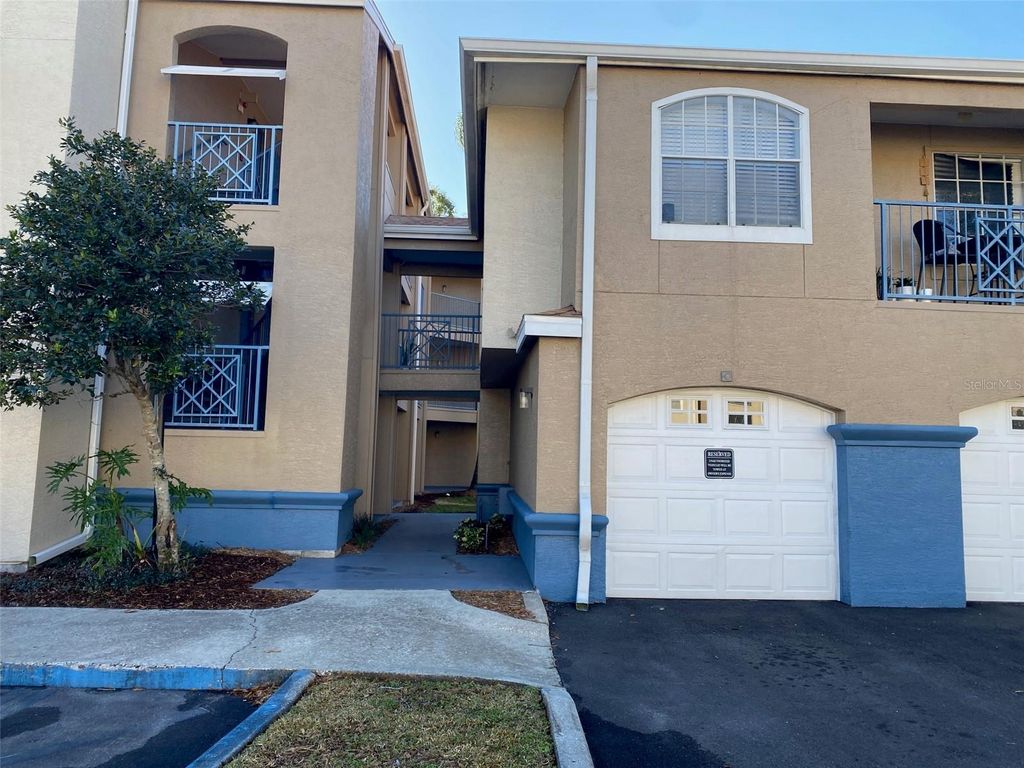 Photo of 7350 Westpointe Boulevard #213, Orlando, FL 32835 (MLS # O6377721)
