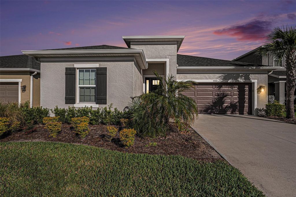 Photo of 33410 Castaway Loop, Wesley Chapel, FL 33543 (MLS # TB8459472)