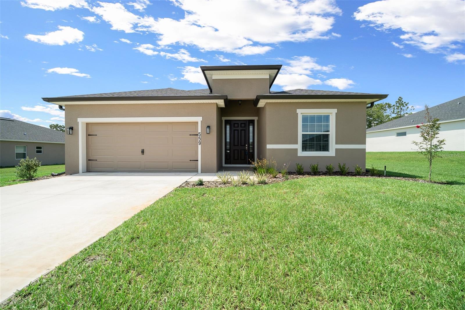 Be the very first to call this stunning brand-new home yours! This thoughtfully designed 4-bedroom, 3 bathroom home offers spacious living, modern finishes, and a move-in-ready experience. Enjoy a light-filled open floorplan with soaring 9'4" ceilings, a beautifully appointed kitchen featuring a large counter-height island, walk-in pantry room, and adjacent dining café, perfect for special gatherings. The spacious owner’s suite boasts a grand double-door entry, tray ceiling, huge walk-in closet, and a luxurious en-suite bath with dual vanities and tiled shower. Additional highlights include a Jack-and-Jill bath with dual sinks for bedrooms 3 and 4, a convenient guest powder room, and an inside laundry room with laundry sink. Enjoy Florida living on the covered lanai, perfect for morning coffee or evening relaxation. All of this in a great location, close to grocery stores, retail, and all the amenities of town. Lawn maintenance is included at no additional charge! No pets allowed. First month’s rent, last month’s rent, and security deposit required. Full and complete background check required. This is your opportunity to live in a beautiful, never-lived-in home with everything you need and more.