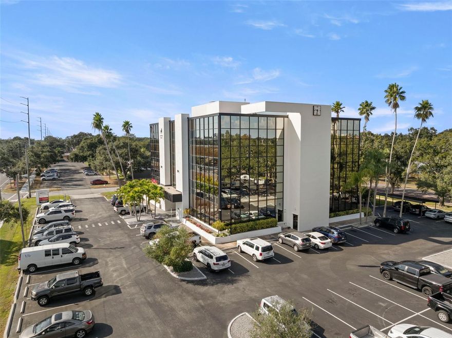 Premier Office Suite for Lease – Central Avenue frontage.  Available for lease at Central Place,  5999 Central Ave, Suite 200-  1,611 SF office suite is located within a four-story, glass-fronted professional building offering a sophisticated business environment. The  1,611 SF suite features a formal reception area, four private offices, storage area , and a private in-suite restroom. Select offices enjoy expansive window views and abundant natural light, creating an inviting and productive workspace. The building is well-maintained and offers common area restrooms on every floor, ample on-site parking, and convenient access and visibility along Central Avenue and 1st Ave.   There is a Cafe onsite and Red Mesa Mercado, newly opened next door, provides great dining options ideal for client meetings or daily convenience. An excellent opportunity for professional, medical, or executive office users seeking a high-visibility St. Petersburg location with great amenities and easy access from downtown and the Gulf Beaches.