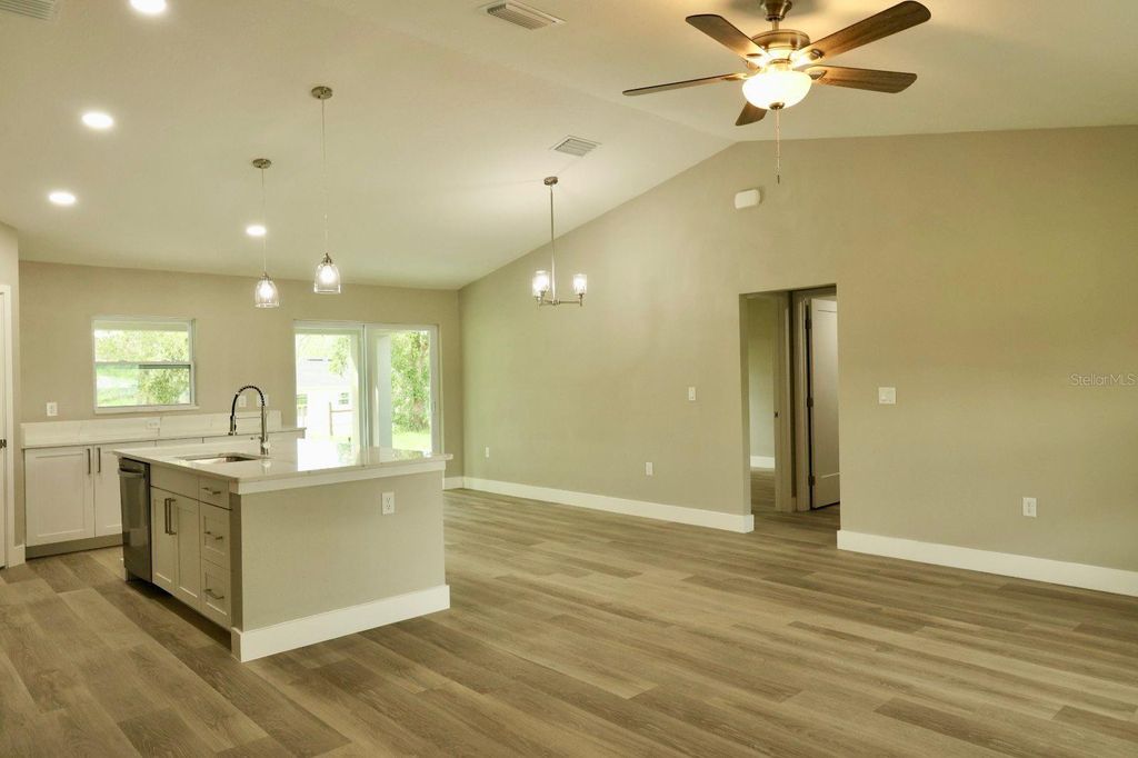 Photo of 15 Malauka Pass Way, Ocklawaha, FL 32179 (MLS # O6353998)