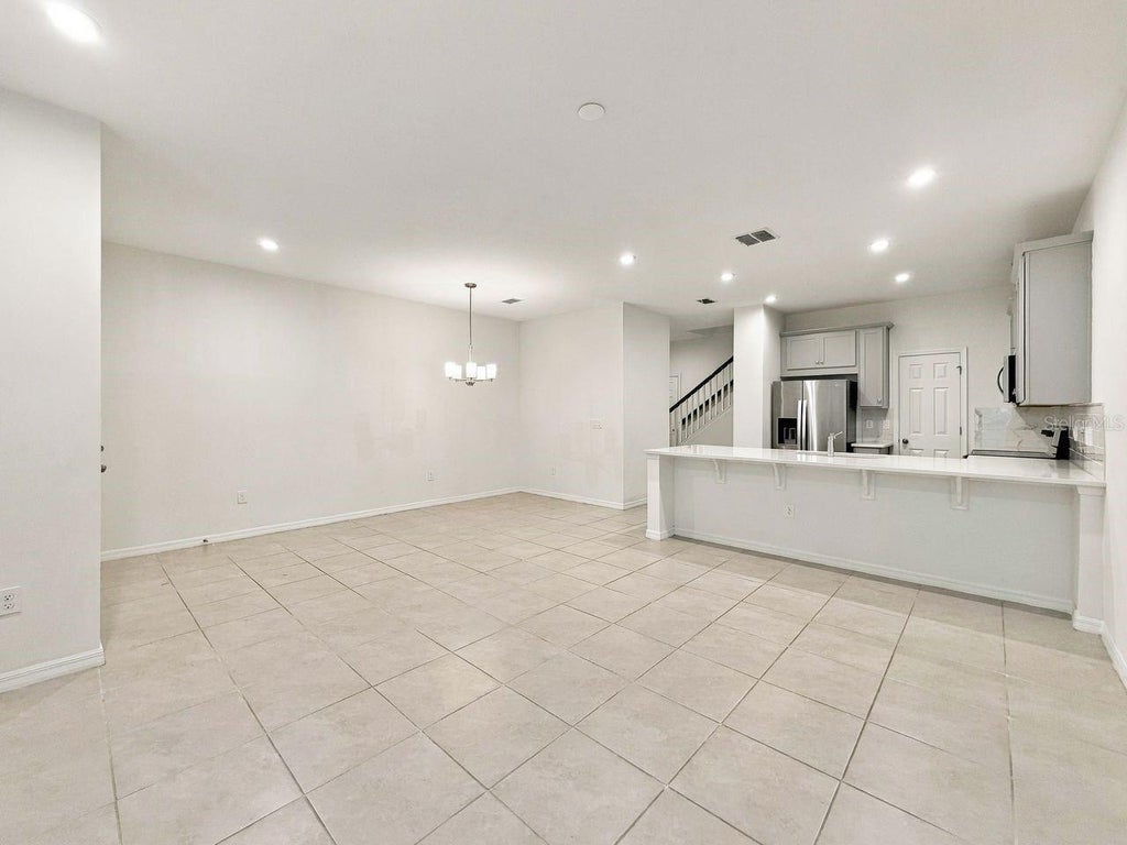 Photo of 8867 Herencia Alley, Windermere, FL 34786 (MLS # O6449612)