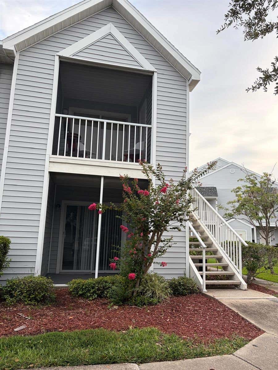 Photo of 1218 Bermuda Lakes Lane #104, Kissimmee, FL 34741 (MLS # S5155104)
