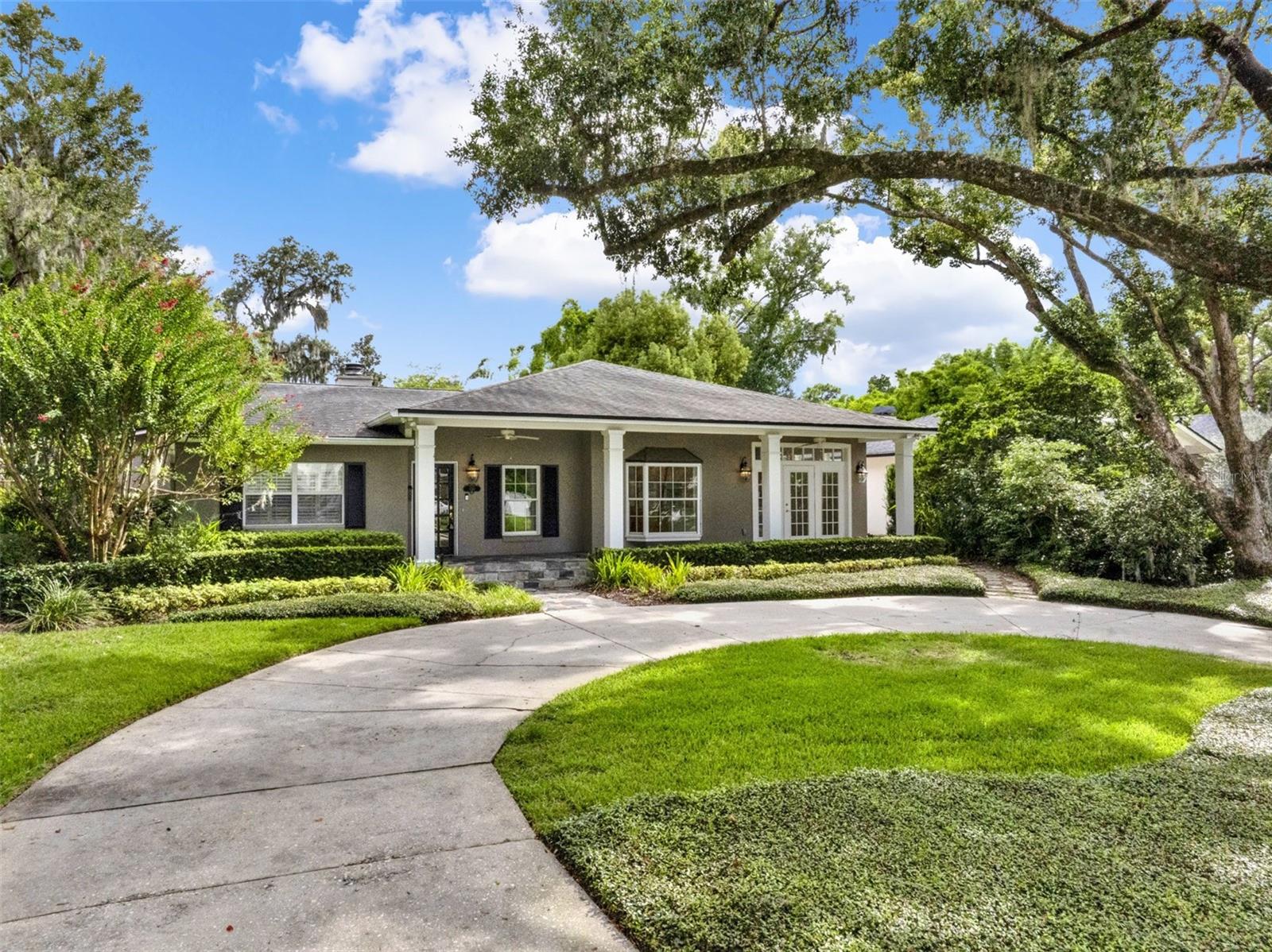 Amazing opportunity in the Forest Hills subdivision in the heart of Historic Winter Park! As you enter this charming 4 bedroom home you’re welcomed by a spacious dining room that flows seamlessly into the large family room with fireplace, custom built-in shelving and storage cupboards, crown moulding and views over the rear yard and patio, perfect for relaxing or entertaining. To the front of the home, enjoy a bright and expansive kitchen/family space featuring upgraded appliances including a Sub-Zero refrigerator and built-in coffee maker, stone countertops, and ample room for casual dining and lounging. The private primary suite includes its own bathroom, while three additional generously sized bedrooms share well-appointed bathrooms. Hardwood floors, charming details, and mature landscaping add timeless appeal. Set on a tree-lined street with a circular driveway, just minutes from Park Avenue, Rollins College, and top-rated schools, this is your chance to create your dream home in one of Winter Park’s most coveted neighborhoods!