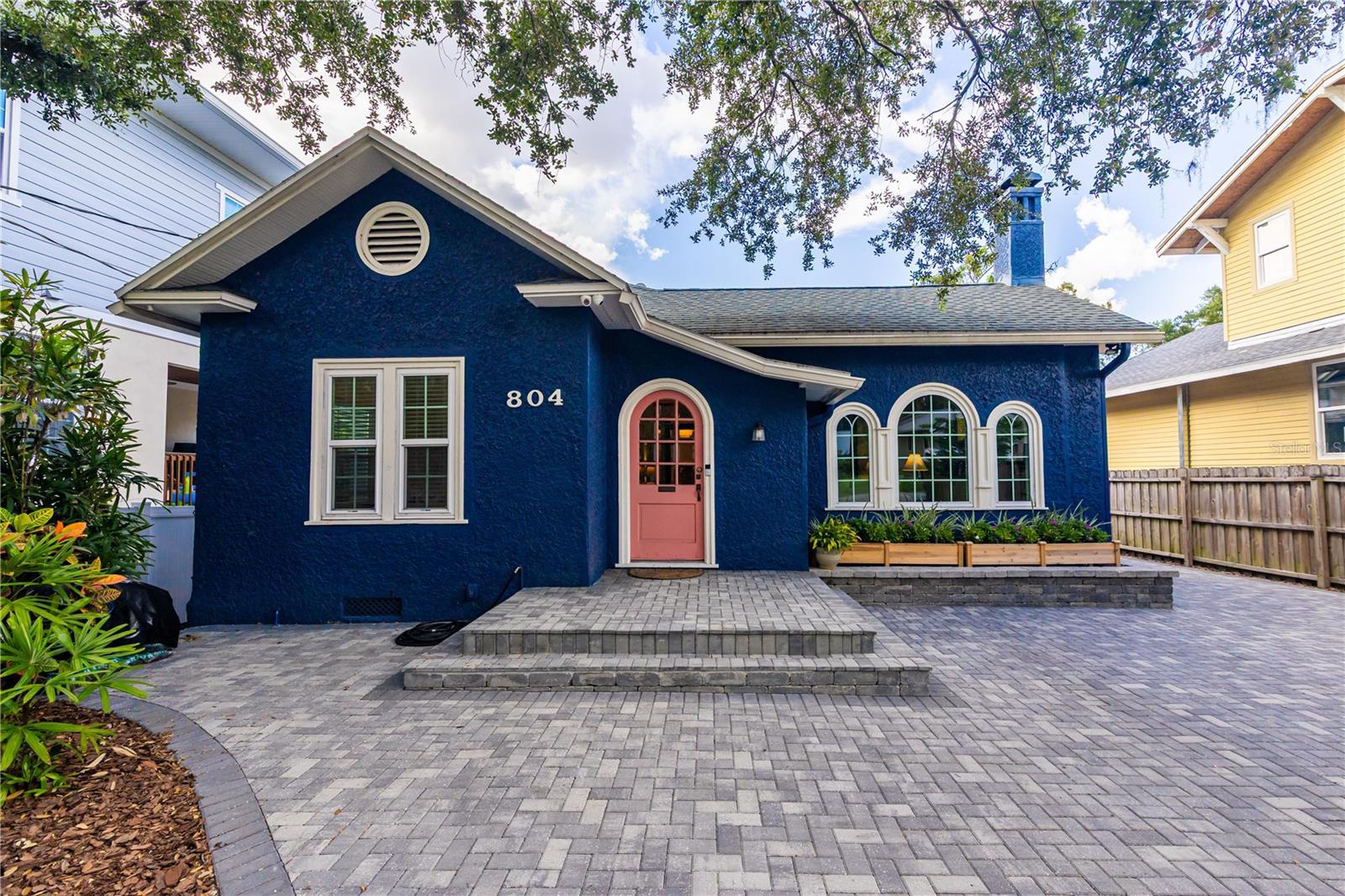 Welcome to riverfront living with a twist of vintage charm and modern updates. This well maintained 1920s bungalow is full of character and functionality. The main house offers 2 spacious bedrooms, 1 bathroom, and a finished attic that makes for a great office or creative space. The guest house has its own 1 bedroom, 1 bathroom setup, plus a bonus room that can double as a home office or storage—whatever works best for you. It also features a screened-in porch overlooking the Hillsborough River, perfect for watching the manatees, alligators and dolphins with your morning coffee.
Love the water? You’ll enjoy the new 10,000 pound boat lift added in 2024, and new composite dock decking added just this year. Take a boat ride from your backyard to Rick's On The River, Armature Works, past downtown to Beer Can Island and beyond. And if you’re more of a stay-on-land person, the screened-in pool has you covered for sunny weekend hangs with family and friends. Recent upgrades include hurricane-rated windows (2023), a new air conditioning system (2024), water heater (2023), refrigerator (2024) and a brand-new pool pump—so you can move in with confidence.
Part of Old Seminole Heights, you’re minutes from some of Tampa’s most talked-about spots. Grab a craft beer at Magnanimous Brewing, catch dinner at Rooster & the Till, or relax at Lowry Park. ZooTampa is also just around the corner—perfect for out-of-town visitors or when you need a little weekend adventure.
With easy access to major roads and all the local flavor Tampa has to offer, this is more than just a home. It’s a lifestyle. Pack your paddleboard… or just a good pair of sunglasses. Either way, you’re going to love it here.