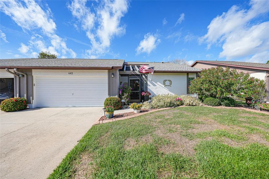 Discover the vibrant 55-plus community of Foxwood in sought-after Englewood, FL where RESORT-STYLE living is at your fingertips!  This skillfully RENOVATED VILLA features 2 bedrooms, 2 bathrooms and a TWO CAR GARAGE with every detail reflecting TOP TIER FINISHES - undoubtedly the finest villa in the neighborhood! ~ Inside you'll find warm toned CERAMIC PLANK TILE throughout the main areas enhanced by sophisticated trim, crown molding and raised panel doors.  Abundant natural light streams in through PLANTATION SHUTTERS and the elegant glass-paneled rear door while recessed lighting, modern ceiling fans and chic fixtures elevate the atmosphere. ~ The kitchen has been fully re-imagined featuring CUSTOM floor-to-ceiling solid wood cabinetry, quartz countertops, SS appliances, closet pantry and a breakfast bar area that comfortably seats four. ~ The original lanai has been cleverly converted to an ADDITIONAL AIR CONDITIONED LIVING SPACE adding valuable square footage perfect for home office or a cozy relaxation area. ~ Privacy between bedrooms is ensured by pocket doors.  The SPACIOUS primary suite easily fits king sized furnishings and includes a large WALK-IN CLOSET and an en-suite bathroom with a newer vanity and an updated redesigned step-in shower with tasteful tile work.  The second bedroom offers an equally refined ambiance complete with a built in closet and easy to maintain durable carpeting throughout both sleeping areas.  The guest bathroom has also received modern updates as well! ~ Step outside to the EXTENDED BACKYARD PATIO where mature pitch apple trees provide SHADE and PRIVACY with no neighbors behind! This peaceful retreat includes a brand new, never used awning - a perfect place to enjoy breathtaking cotton candy sunsets!  Likewise, the screened in front lanai is roomy and perfect for tending plants or savoring morning coffee as you watch the sunrise over the meticulously landscaped grounds and blooming flowers. ~ Additional highlights include IMPACT WINDOWS for peace of mind, tankless water heater, recently epoxied garage floor, glass storm door connecting kitchen to garage adding more light, NEWER ROOF and front and back rain gutters! ~ This relaxed and MAINTENANCE FREE community offers a clubhouse brimming with recreational amenities such as pickleball, tennis and a HEATED POOL/SPA just to name a few.  CABLE/INTERNET INCLUDED plus a COMMUNITY TV CHANNEL that keeps you updated on upcoming events! This area boats pedestrian-friendly sidewalks, city water/sewer, underground utilities, NO CDD fees and in an X flood zone potentially sparing you from insurance costs! The association fees will be reduced as of Jan 2026 too! ~ Downtown Dearborn St is a short walk or golf cart ride away with Farmer's markets, charming boutiques and restaurants to explore! Or catch a play at the local theatre! PRISTINE GULF BEACHES are only a brief drive away and activities like golfing, boating, kayaking and fishing are readily accessible!  For those craving the buzz of city life, Sarasota is 45 minutes away.  Convenient access to nearby/local airports.  ~ Herald tribune recently published that ENGLEWOOD is listed as NUMBER ONE in the top 10 list of AFFORDABLE TOWNS for SNOWBIRDS!  It says "When winter bites, Englewood offers a sun-soaked escape with temperatures that can reach the low 70s. The Gulf Coast’s calm, clear waters and soft beaches make it a perfect retreat from the cold."  Make this your SEASONAL getaway or full-time residence!