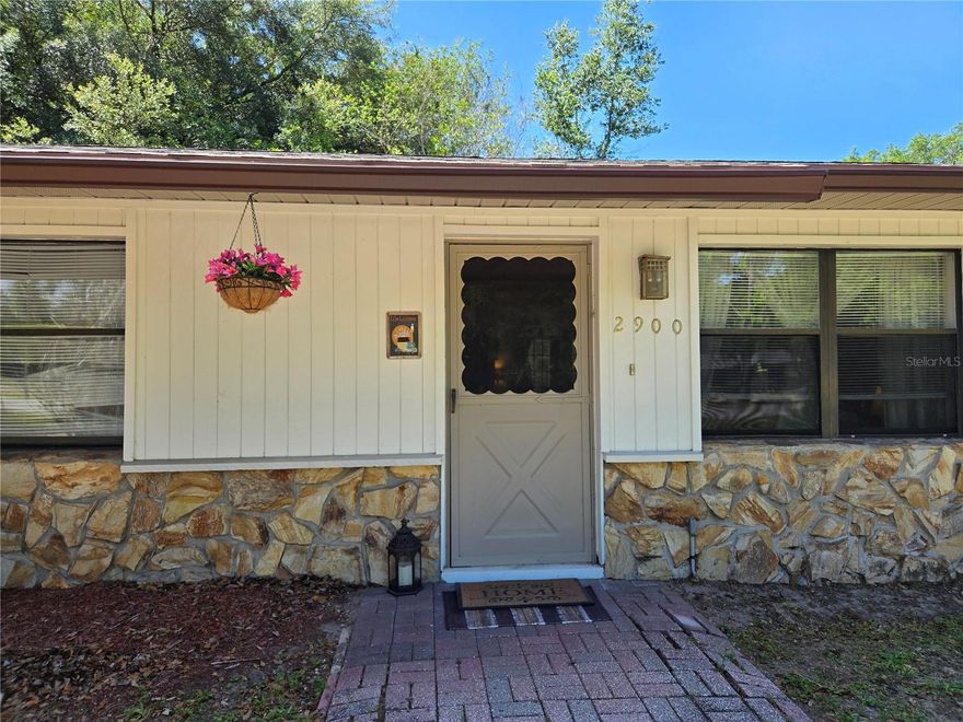 NO HOA and plenty of space to enjoy in this conveniently located Northeast Ocala home! This 3-bedroom, 2-bath home features a desirable split-bedroom floor plan and a comfortable layout designed for everyday living. The living and dining combination opens through French doors to a screened enclosed lanai, creating a great indoor-outdoor flow for relaxing or entertaining. The kitchen offers a built-in pantry closet and breakfast bar for casual dining. The primary suite includes a private bath and walk-in closet, while the additional bedrooms provide comfortable guest space with nearby guest bath access. Enjoy the privacy of the fenced backyard viewed from the lanai. The spacious indoor laundry room offers extra flexibility for a home office, craft room, or additional storage space. Updates include a NEW ROOF in 2025, gutters and a new dryer in 2026. Complete with a one-car garage and an easy commute to Gainesville, this property offers comfort, convenience, and value without HOA restrictions.