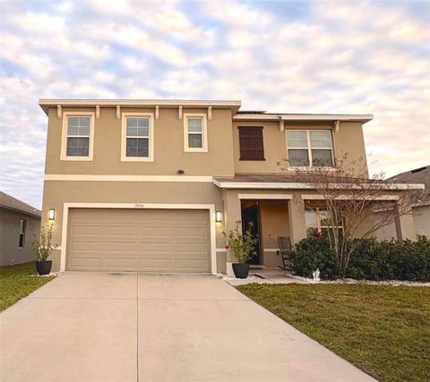 Photo of 13924 Smiling Daisy Place, Riverview, FL 33579 (MLS # TB8465195)