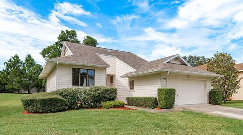 Photo of 1023 Lake Avoca Place, Tarpon Springs, FL 34689 (MLS # TB8416534)