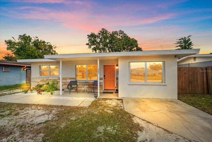 This extensively updated home in Bradenton, Florida offers a rare combination of central location, privacy, and usable lot size. Set back from the street, the property provides a quiet residential feel with generous space between neighboring homes while remaining close to everyday conveniences. The home has been thoughtfully improved over several years with major system upgrades already completed. Updates include a new roof in 2020, HVAC system replaced in 2023, additional blown-in insulation added in 2025, and a new water heater installed in 2025, offering long-term peace of mind for the next owner. Inside, the kitchen has been remodeled with new appliances, a tile backsplash, butcher block countertops, freshly painted cabinets with updated hardware, and a custom pantry cabinet with a glass door added in 2025. The layout is functional and welcoming, designed for functional daily living. Flooring throughout the home has been upgraded, including porcelain tile in the main living areas, replaced carpeting in secondary spaces, and luxury vinyl plank flooring in the laundry and closet area. The laundry and closet remodel also include custom shelving, storage cabinetry, trim, & a combo washer and dryer unit. All baseboards throughout the home were replaced in 2025, creating a cohesive and updated interior finish. The bathroom has been refreshed with a new vanity with quartz countertop and a modern skirted Kohler toilet, continuing the home’s clean and contemporary aesthetic. Updated ceiling fans and door hardware add to the move-in-ready appeal. Outside, the property features a fully fenced backyard with a six-foot wooden privacy fence and double gate, ideal for pets, trailers, boat/RV storage, outdoor entertaining, or future enhancements, the home also includes 2 storage sheds and a hot tub. The front yard landscaping was completed in late 2025 with fresh marble chip gravel beds, improving curb appeal and ease of maintenance. Located near G.T Bray Park, Easy access to the beach, State College of Florida, and the USF Sarasota-Manatee campus, this home offers convenient access to education, recreation, shopping, and dining while maintaining a private residential setting. With major updates already completed and a desirable central Bradenton location, this home is well positioned for full-time living, rentals, & long-term ownership.