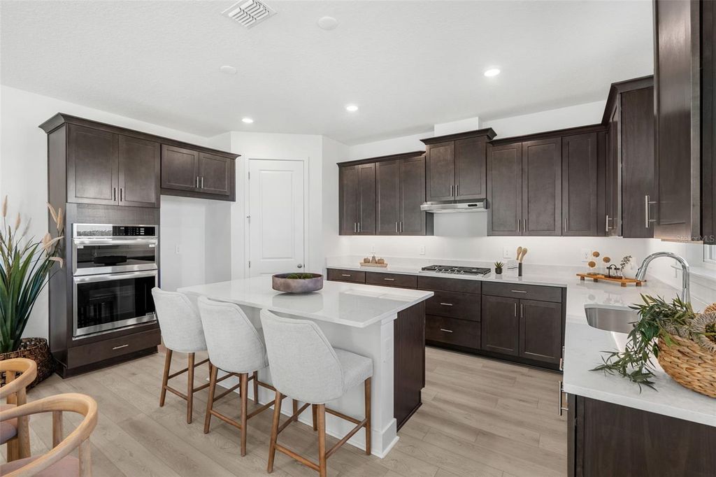 Photo of 810 Emerald Grove Drive, Apopka, FL 32703 (MLS # W7884512)