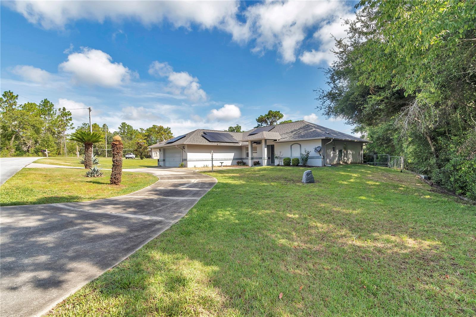 This beautiful home offers a spacious and comfortable living experience with 3 bedrooms and 2 bathrooms. The open floor plan is perfect for family gatherings, and the kitchen provides ample counter space for meal preparation. This well maintained home features open living concept with vaulted ceilings. The open living area opens up to a spacious screened-in back porch; the perfect spot to look onto the inviting backyard that offers the wonderful potential for relaxation and outdoor entertainment. Enjoy the convenience of a 2-car garage, offering plenty of storage and protection for your vehicles. Property includes paved driveway, fenced yard, home generator and Solar Panels included. Located in the peaceful town of Williston, this home is close to schools, shopping, and local attractions, yet tucked away in a tranquil neighborhood. Whether you are a first- time homebuyer or looking for country style living, this home offers a perfect blend of comfort and convenience. Don't miss your chance to make this lovely house your new home!