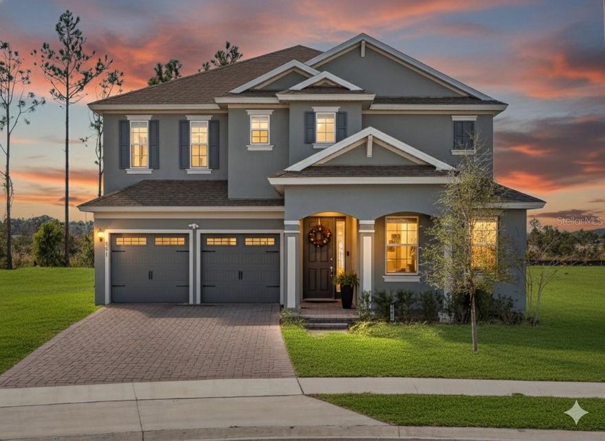 Use link for a fully interactive and exclusive tour. Welcome to your spacious, custom-feel retreat at 591 Via Bella Court. This stunning residence is perfectly situated on an extra-large, pie-shaped lot at the end of a quiet cul-de-sac, offering privacy and curb appeal. Step inside to an inviting open floor plan defined by soaring 9'4" ceilings. The heart of the home is the gourmet kitchen, which boasts: Elegant 42" linen cabinets and luxurious Quartz countertops. A premium appliance package including built-in microwave and oven, and Stainless Steel Appliances. An extra-large island and a dedicated large dining area perfect for entertaining. A substantial walk-in pantry provides incredible storage. The main living areas feature gorgeous 7x22 plank tile, creating a seamless, high-end look. Convenience is key with a Guest Bedroom and Bath located on the first floor. Upstairs, the oversized Master Bedroom Suite is a true sanctuary, featuring dual closets and a lavish spa bath. Enjoy Florida evenings on the welcoming front porch area. Seamlessly blend indoor and outdoor entertaining with pocket sliding doors that open to the expansive backyard. The home is built for efficiency, featuring R38 insulation and double-pane insulated windows. Curb appeal is enhanced by paver driveway, coach lighting, and designer landscaping with irrigation. Nestled in a quiet community, you are minutes away from major Central Florida attractions. Enjoy championship golf with 11 courses nearby, including the renowned Mission Inn Golf Resort & Spa. Close proximity to major lakes for boating and fishing. Quick access to the Florida Turnpike. Centrally located between the charm of Mount Dora and Tavares, the activity of Clermont, and the excitement of Orlando. Experience the perfect blend of luxury, space, and location. This home won't last!