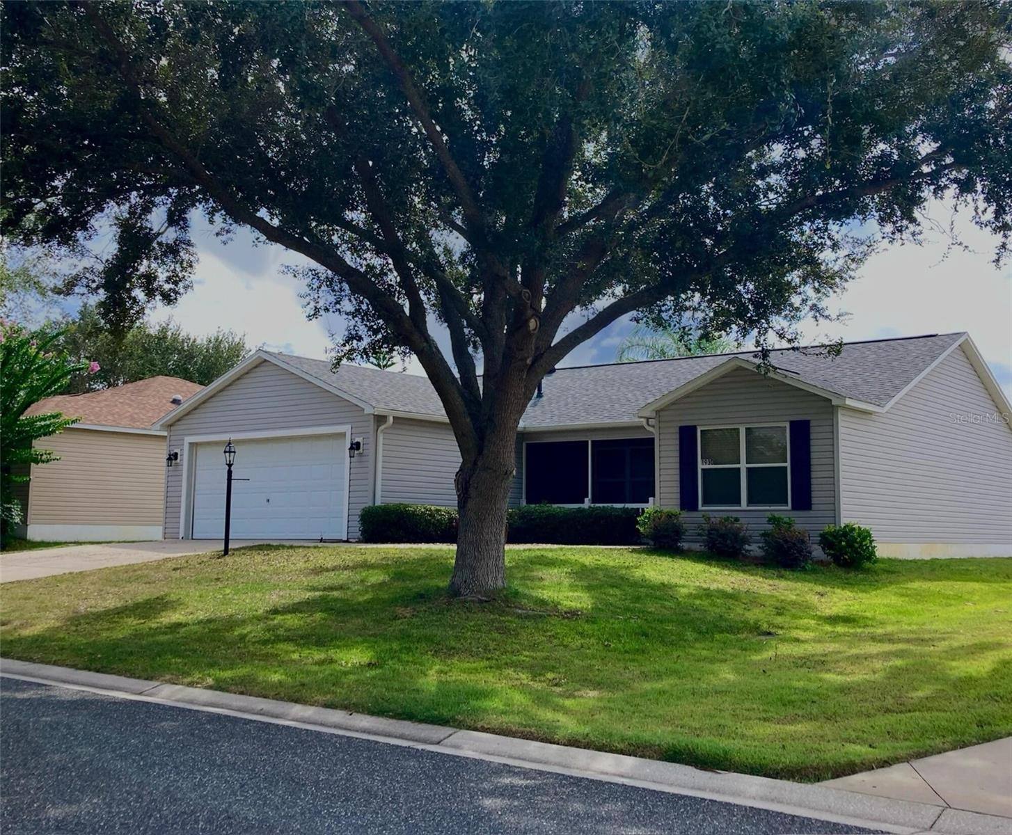 GREAT LOCATION! Beautiful 3 BR/2 bath/2 car garage, Village of Amelia home about 5 MINUTES south of LAKE SUMTER LANDING - with nightly music, dancing, dining, shops, groceries, banks, medical, etc. STEPS FROM THE AMELIA ADULT POOL/rec center - walk to a pool without the hassle of pool maintenance. Half a mile south, the Odell Rec Center has a family pool, pickleball, billiards, bocce, exercise, dance, fencing, clubs, horseshoes, cards, tennis, shuffleboard, & more! This TOTALLY REMODELED home is surrounded by golf...Bacall & Bogart Executive and Havana & Mallory Hill Championship Golf Courses - enjoy the beautiful drive home. 1 mile from the Mallory Hill Country Club & Restaurant! VERY LARGE LOT - NO NEIGHBORS DIRECTLY BEHIND! Gorgeous coastal kitchen, cabinets with pull-outs, garbage disposal, stainless steel appliances (gas stove), new granite countertops, shiplap accents. Huge island - more workspace, storage & seating. Window above the kitchen sink. Vaulted living/kitchen areas gives an open, airy feeling. Primary Suite has very large walk-in closet, ENSUITE with shower & linen closet, window in the master bath lets in natural light. Both guest bedrooms have closets & share a low-maintenance bathroom with a shower/tub combo & TWO more linen closets. Close the pocket door to create a second private suite. Updated ceiling fans with light kits, lighting, and LUXURY VINYL PLANK FLOORING throughout the entire home with NO TRANSITIONS STRIPS! Spacious inside laundry with Maytag washer / dryer included, lots of storage & utility sink. . Hand trowelled ceilings, newer modern blinds on all windows. Fresh exterior updates: new exterior lighting, new shutter paint, trimmed landscaping. Screened front porch. Relax on your screened rear lanai, with ceiling fan & extra patio slab perfect for grilling. Privacy hedges behind ROOF REPLACED (5/2023), HVAC (2019/2023), NEW gas water heater! Furniture available! Low bond! Property Inspected for Termites: June 2025! Lower Sumter County Taxes! Enjoy The Villages lifestyle with so many amenities for you: golf, shopping, dining, clubs, live entertainment, medical services & more, all accessible by golf cart. Don't miss your chance to own this upgraded home in the center of it all!