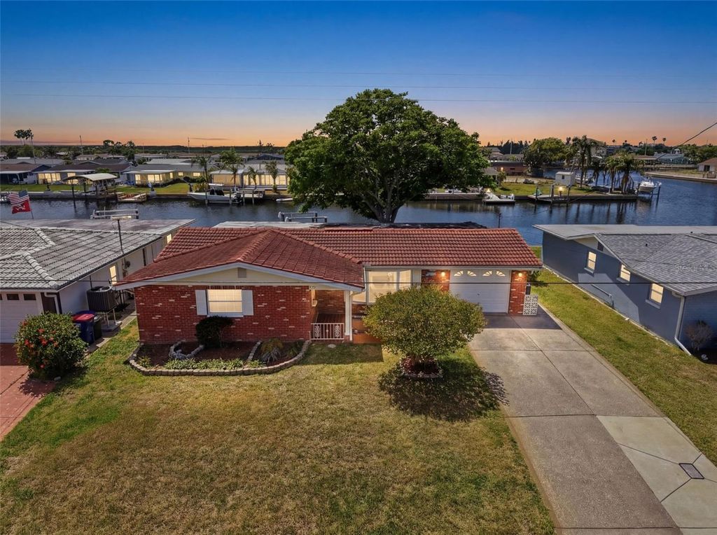 Photo of 12813 3rd Isle, Hudson, FL 34667 (MLS # W7885171)