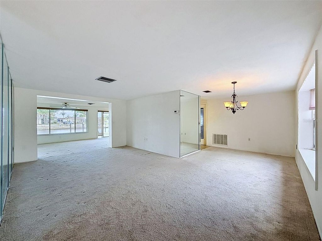 Photo of 12813 3rd Isle, Hudson, FL 34667 (MLS # W7885171)