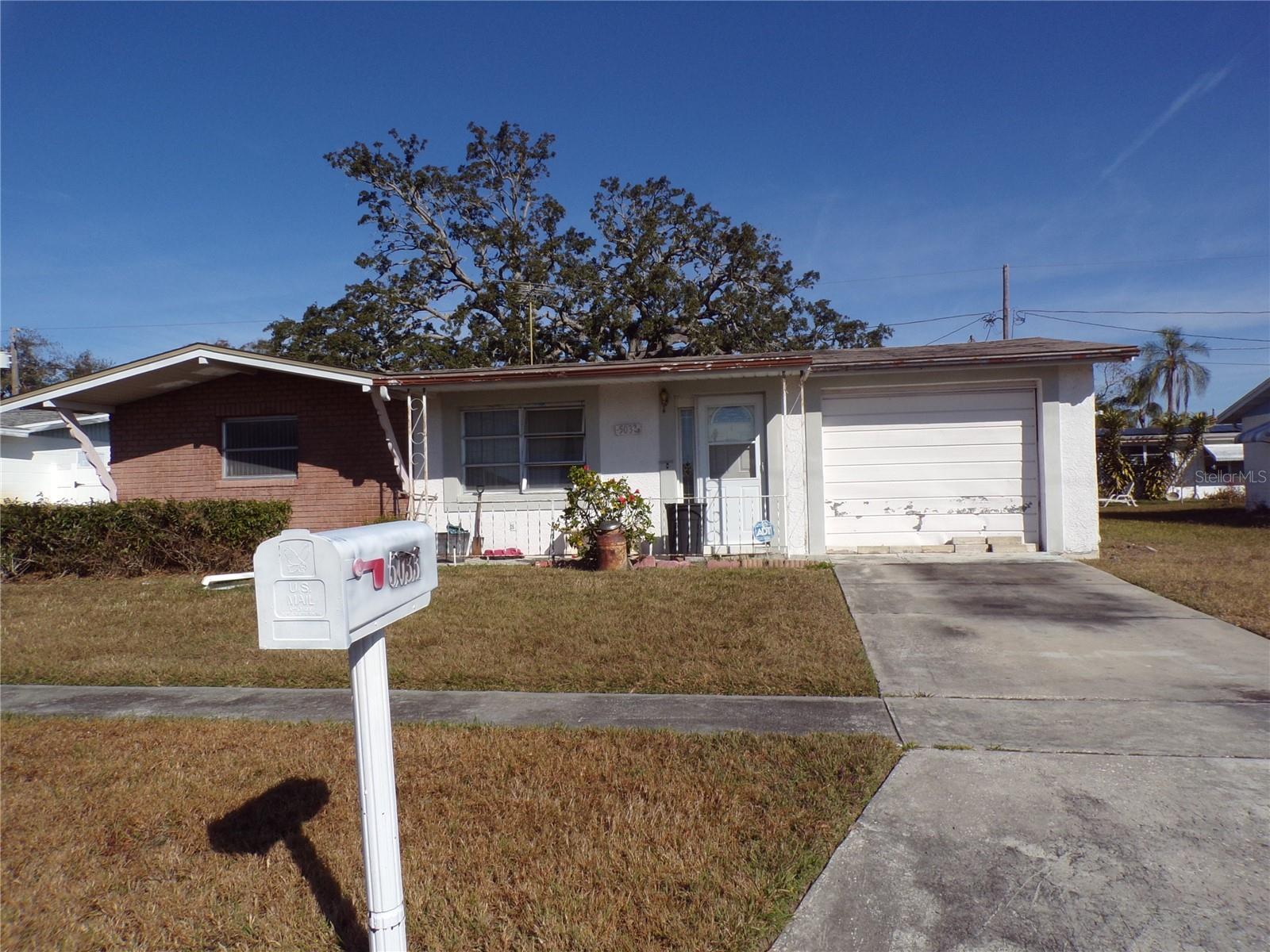 Must see this 2 bedroom, 1 bath, 1 car garage with Florida room and Bonus room located in Holiday, Florida. Needs work and TLC but would be great for 2nd home or starter home. Don't miss out on this great opportunity. Please note! No verbal offers, no wholesalers, blind offers and assignable contracts will be considered by sellers and all buyers and or Realtors must be registered with selling office. Please do your Inspections prior to writing and presenting your offers and allow up to 3 days for TOA. All offers must be filled out and POF in buyers name and disclosures attached and signed by buyers in order to be considered. Any Chattel being left at closing is for convenience of sellers. No low offers.