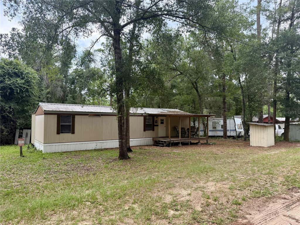 Photo of 20445 NE 144th Lane, Fort Mccoy, FL 32134 (MLS # OM730158)