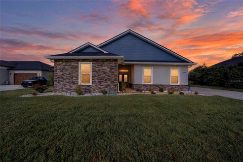 Photo of 9664 SE 61st Terrace, Belleview, FL 34420 (MLS # OM733174)