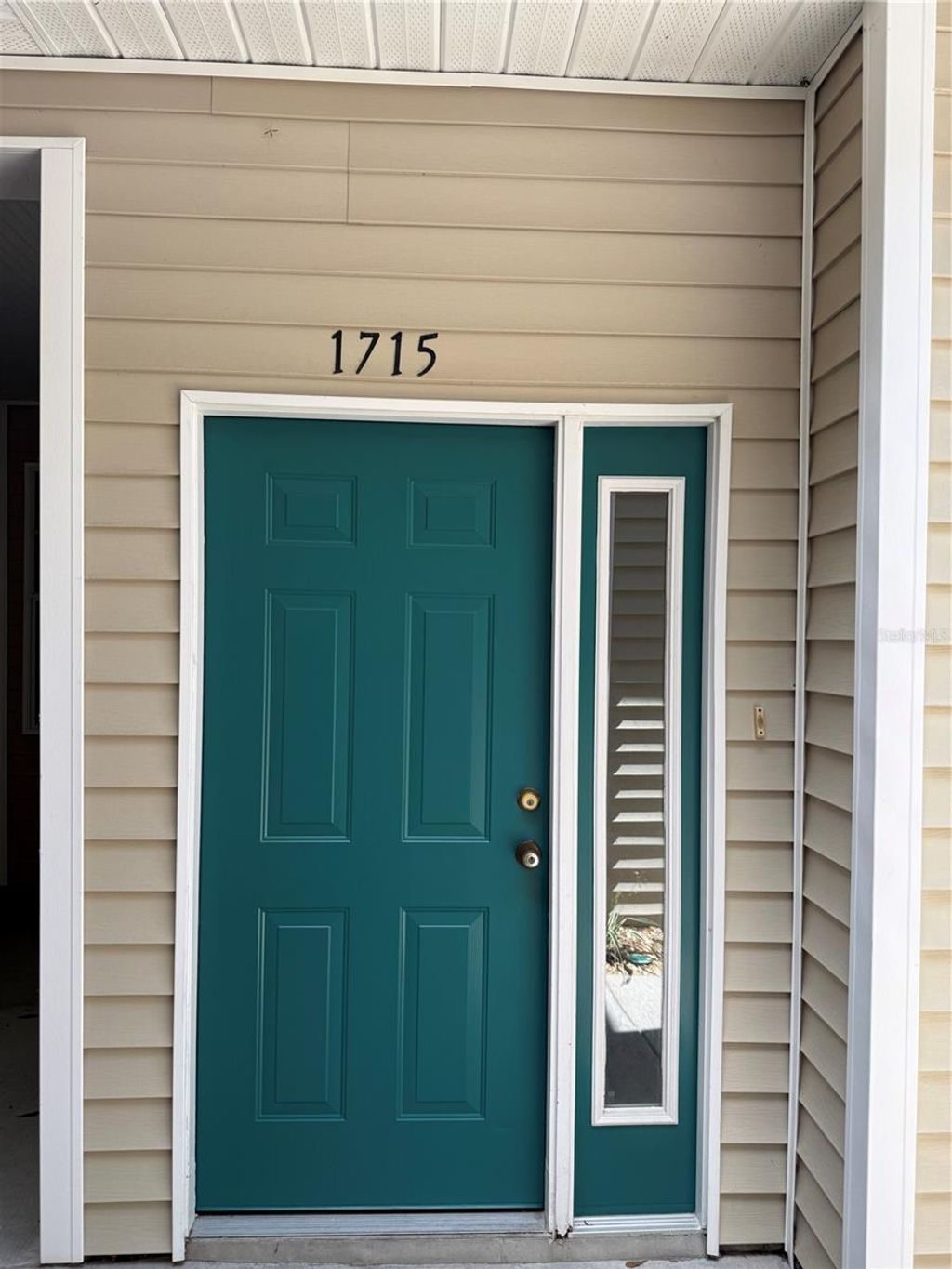 Photo of 1715 Hammocks Avenue #1715, Lutz, FL 33549 (MLS # TB8492861)