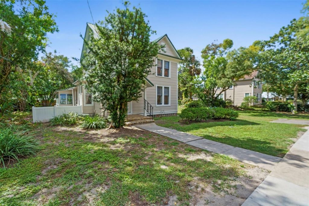 Photo of 210 W University Avenue, Deland, FL 32720 (MLS # V4945577)