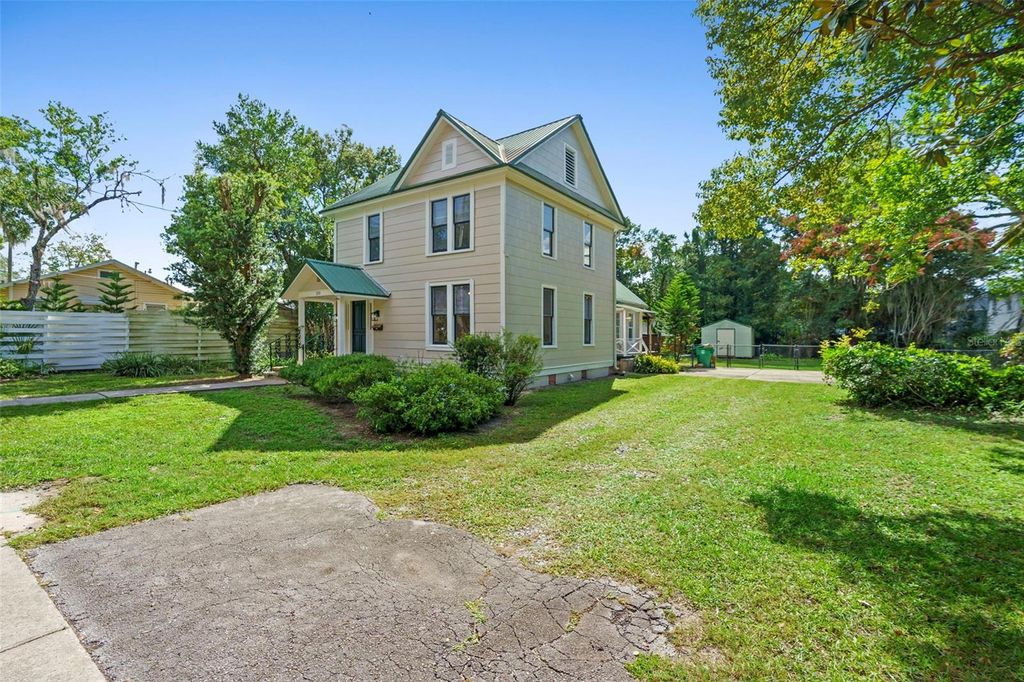 Photo of 210 W University Avenue, Deland, FL 32720 (MLS # V4945577)