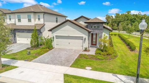 Photo of 7951 Rumney Lane, Reunion, FL 34747 (MLS # O6418084)