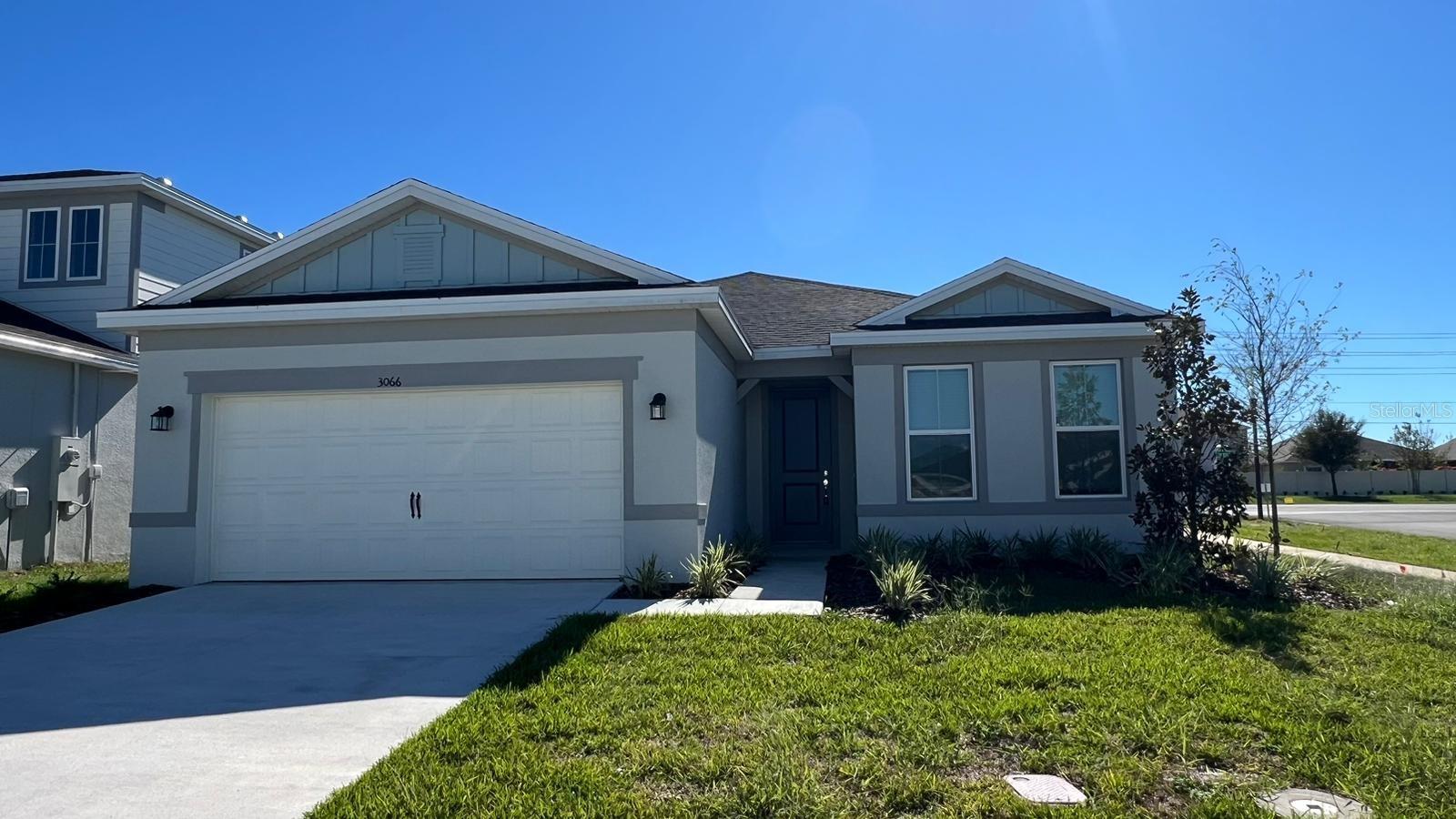 Discover this stunning new 4-bedroom single-family home available for rent! Its open layout combines the family room, kitchen, and dining area, ideal for hosting gatherings. The kitchen boasts quartz countertops, stainless steel appliances, and a convenient pantry. The primary bathroom features dual sinks, a spacious walk-in shower, and a large walk-in closet. Enjoy the ease of single-story living with a split bedroom design for extra privacy. The property includes a covered back lanai, an attached two-car garage, and a laundry room equipped with a full-sized washer and dryer. Lawn care is included in the monthly rent. Future amenities will include a pool, playground, and dog park! Conveniently located just off Highway 27, you'll be near a variety of restaurants and shops, with easy access to Posner Park and I4. Schedule your tour today!