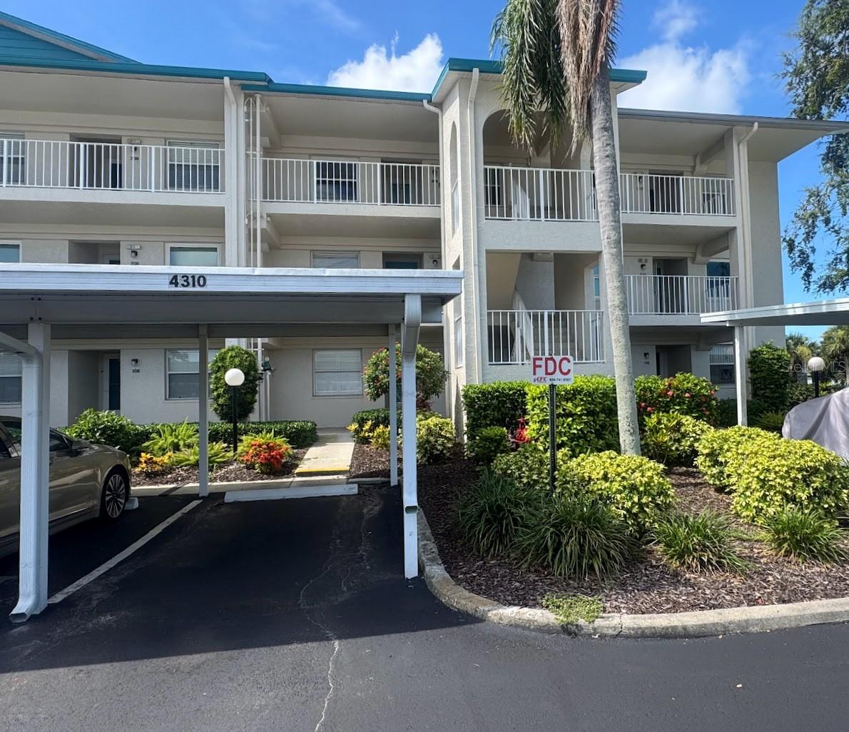Bright & Airy End Unit Just Minutes from the Beach!
Welcome to 7301 29th Ave Drive W #310, a stunning end-unit condo perfectly located in the heart of West Bradenton. This beautiful home offers extra natural light thanks to its end-unit position, filling the space with sunshine and creating an inviting atmosphere from the moment you enter. Your front door is tucked away, but also right next to the stairs where your reserved covered parking spot awaits you downstairs. Or if you prefer, the elevator is just a few extra steps and located in the center of the building. Enjoy the open, spacious feel provided by the VAULTED CEILINGS, enhancing the living and dining areas to make everyday living and entertaining comfortable and cheery. Whether you’re starting your morning with coffee in your bright kitchen or winding down in your cozy living room, you’ll love the warmth and brightness that only an END UNIT can provide. Great split floor plan, an updated kitchen, flooring, bathrooms, and AC from 2000 will leave you enjoying it rather than having a to do list. Rest easy with a roll down hurricane shutter on the back patio windows. Located directly off 75th Street, this condo offers unbeatable convenience with two easy routes to the BEACH – just 10 minutes via Manatee Avenue or Cortez Road. Spend your weekends soaking up the sun on Anna Maria Island, relaxing at Bradenton Beach, or enjoying waterfront dining and breathtaking sunsets – all just a short drive away! But being inland gives you peace of mind during our storm season. This home is perfect as a primary residence or winter retreat with its prime location not only 10 minutes from the beach, but near shopping, dining, medical facilities, and golf courses. Don’t miss your chance to own this bright, airy, and perfectly located condo. Schedule your private tour today and experience the best of Bradenton coastal living!
