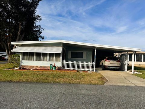 Photo of 106 Bougainvillea Drive, Leesburg, FL 34748 (MLS # R4910523)