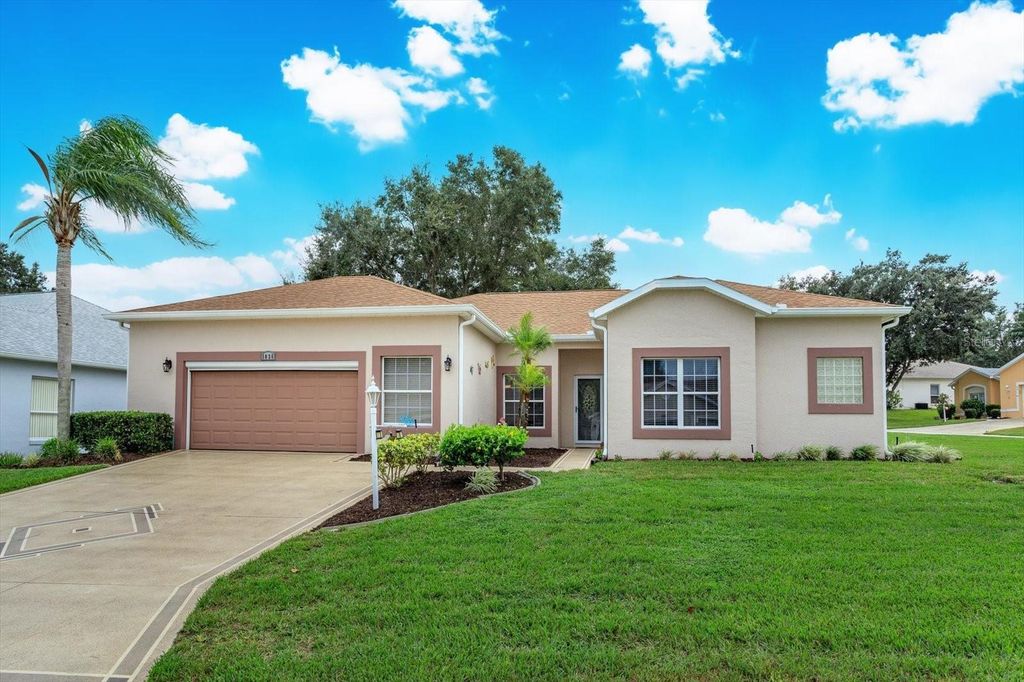 Photo of 5036 Sawgrass Lake Circle, Leesburg, FL 34748 (MLS # G5102886)