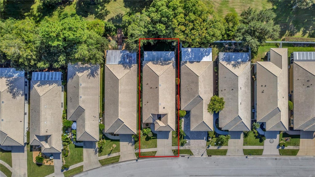 Photo of 8023 Saint Andrews Way, Mount Dora, FL 32757 (MLS # O6448616)