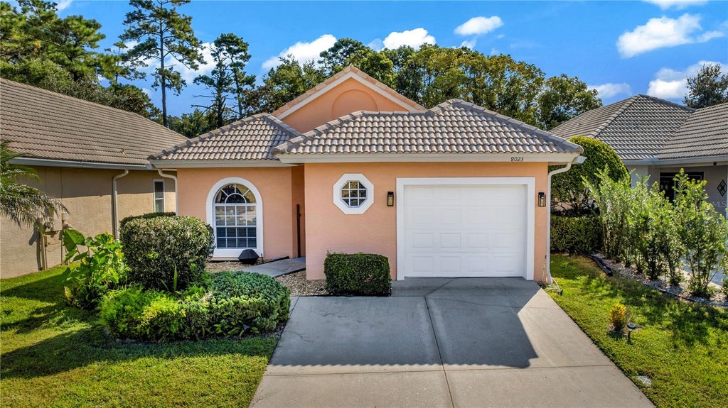 Photo of 8023 Saint Andrews Way, Mount Dora, FL 32757 (MLS # O6448616)
