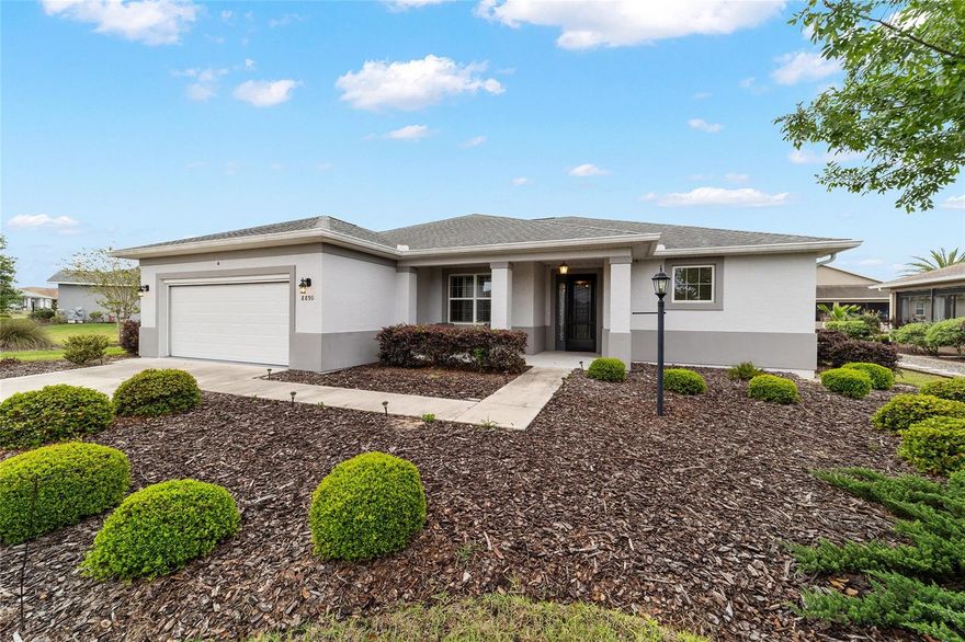 Welcome to the Livingston model in Avalon Phase 7. This like new (2020 built) beautiful 3 bedroom, 2 bathroom home with a 2 car garage and a grand back lanai with privacy screens lets in fresh air while keeping your space private. Located in one of Ocala’s premier gated 55 plus communities provides ample amenities and golf cart access to two shopping centers. This home offers comfort, beauty, and easy living in one perfect place. Step inside and enjoy a bright open floor plan with a stunning kitchen featuring granite counters, stylish tile backsplash, under cabinet lighting, a large kitchen island, and a large walk-in pantry. The living room opens to a screened lanai through wide sliding doors, bringing in lots of natural light. The lanai has new windows and screens so you can enjoy outdoor living almost all year round. Add A C or a mini split and you could gain about 260 more square feet of living space! The primary suite is quiet and relaxing with a large walk in closet, a spacious bathroom with dual sinks, granite counters, and a large walk in shower. The other bedrooms are placed on opposite sides of the home, giving everyone privacy. This home won't last long! Schedule your showing today!