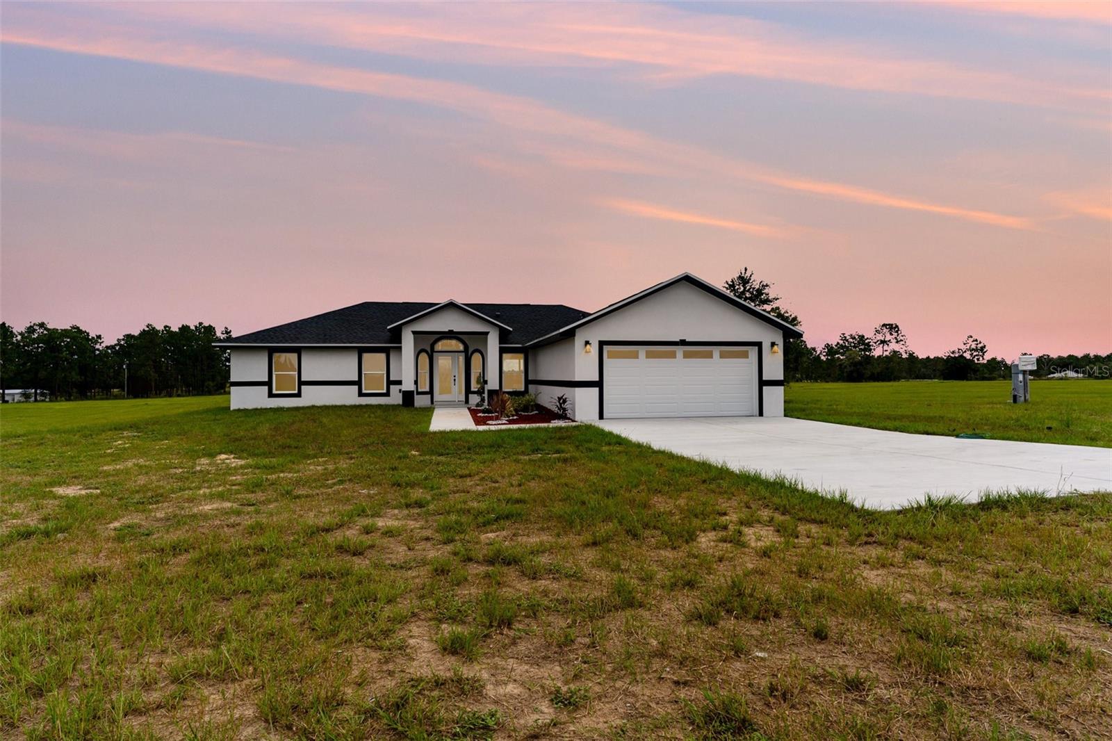 10-Acre Agricultural Paradise with Brand New Constructions 3-Bed, 2-Bath Home and Office and fully fenced !
Escape to the tranquility of Morriston, Florida with this stunning new construction home perfectly set on 10 sprawling acres of agricultural land. Designed for comfort and modern living, this 3-bedroom, 2-bath residence blends contemporary finishes with the charm of rural life.
Inside, you’ll find an open-concept layout, high ceilings, and an abundance of natural light. The kitchen features sleek cabinetr qurtz countertops, and stainless steel appliances, while the spacious living area offers the perfect gathering space for family and friends. The primary suite boasts a walk-in closet and a private en-suite bath for ultimate relaxation.
Step outside to your private agricultural haven — ideal for horses, livestock, farming, or simply enjoying the wide-open spaces. With 10 acres of flat, usable land, the possibilities are endless: build barns, create gardens, or expand your homestead vision.
Located just minutes from Ocala and Williston, you’ll enjoy the peace of country living while still being close to shopping, dining, and equestrian venues.
Property Highlights:
10 Acres Zoned Agricultural
Brand New 3 Bed / 2 Bath Home
Modern Finishes & Open-Concept Design
Room for Horses, Farming, or Recreation
Quiet & Peaceful Location with Easy Highway Access