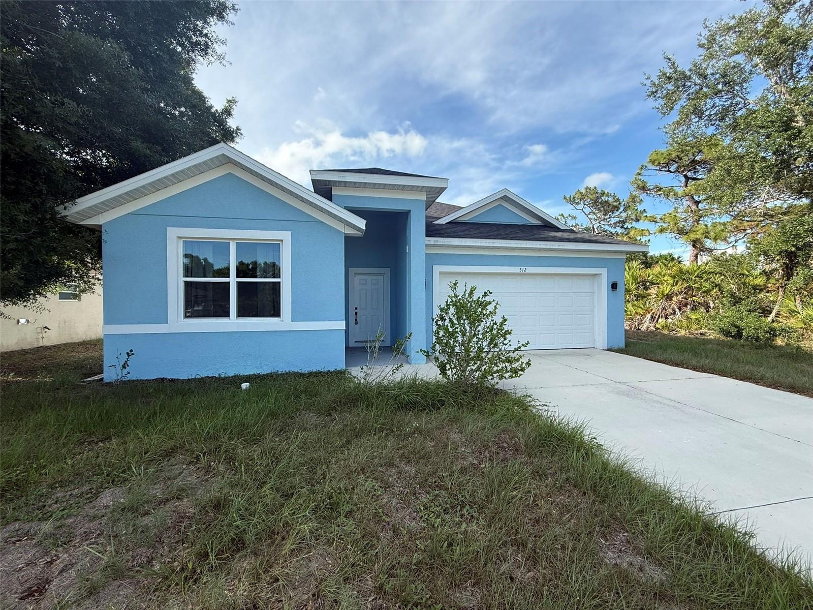 Photo 1 of 16 — 512 SUNSET ROAD N, ROTONDA WEST, FL 33947