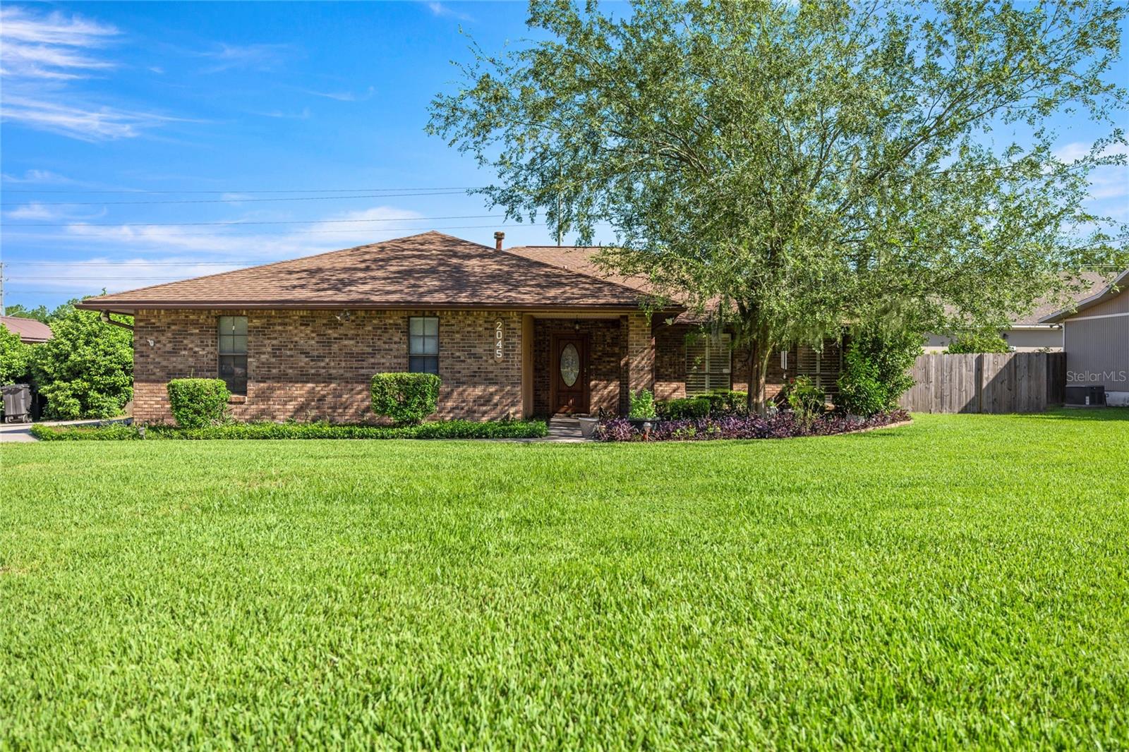 Spacious SE Ocala Gem with Room for Everyone! Welcome to this beautifully maintained 3-bedroom, 2-bath home located in a quiet and desirable Southeast Ocala neighborhood. Boasting over 3,300 square feet under roof, this home offers the perfect blend of comfort, space, and functionality—ideal for families and entertainers alike. Step inside to find multiple living areas, including a formal living room, a cozy family room with a charming wood-burning brick fireplace, and a versatile sunroom/bonus room with double French doors that lead to the expansive back deck—perfect for enjoying the peaceful privacy-fenced backyard. You'll also find the spacious kitchen featuring stainless steel appliances, a pantry, and a breakfast nook that flows into the separate formal dining room. The home also offers a dedicated office/den with two sets of French doors, providing ample natural light and a quiet space for work or study. The spacious master suite includes a walk-in closet, dual vanities, and a walk-in shower, while two generously sized guest bedrooms and a full guest bath provide comfort for family or visitors. Additional highlights include: a sitting area with closet just outside the bedrooms; inside laundry room with utility sink and built-in cabinets; 2-car garage with plenty of storage cabinets; large back deck with gazebo/canopy for entertaining; beautiful natural light throughout the home; and easy-care flooring in main living areas. This home combines functionality, warmth, and location—all in one unbeatable package.